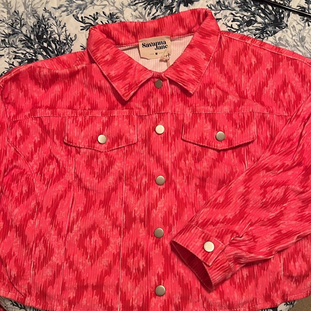 Patterned cropped jacket with rhinestones.